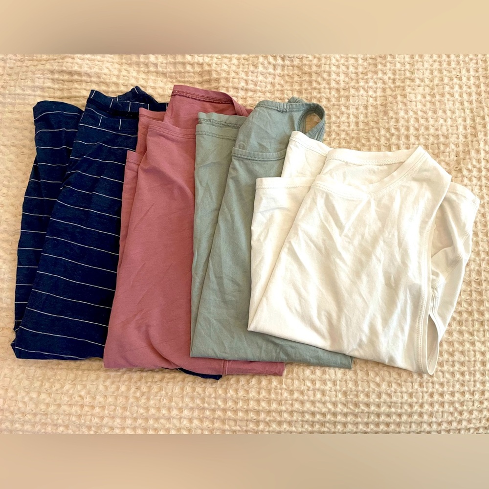 Lot of 4 Lululemon tanks - gently used condition. All various styles, size 4-6.
